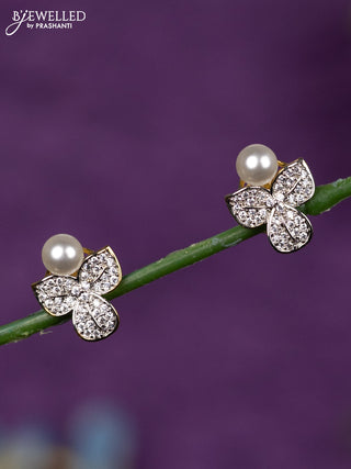 Zircon earrings leaf design with cz stones and pearl in gold finish