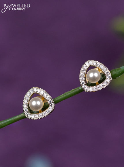 Zircon earrings with cz stones and pearl in gold finish