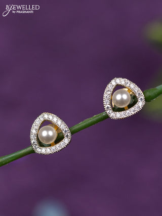 Zircon earrings with cz stones and pearl in gold finish