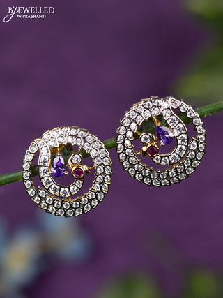 Zircon earrings peacock design with purple and cz stones in gold finish