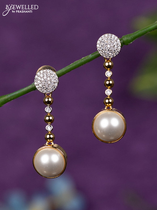 Zircon earrings with cz stones in gold finish