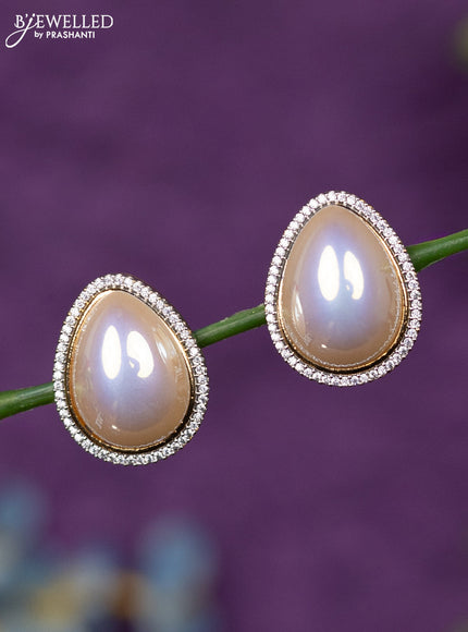 Zircon earrings with cz stones in gold finish