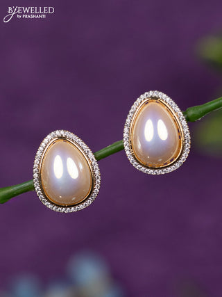 Zircon earrings with cz stones in gold finish