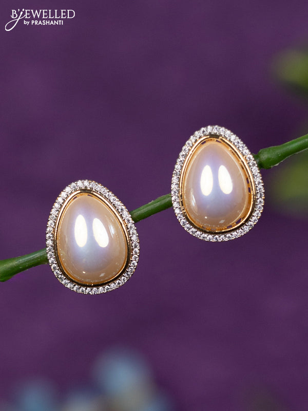 Zircon earrings with cz stones in gold finish