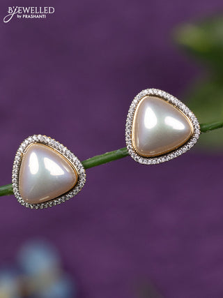 Zircon earrings with cz stones in gold finish