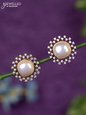 Zircon earrings with cz stones in gold finish