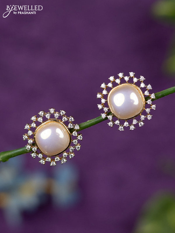 Zircon earrings with cz stones in gold finish