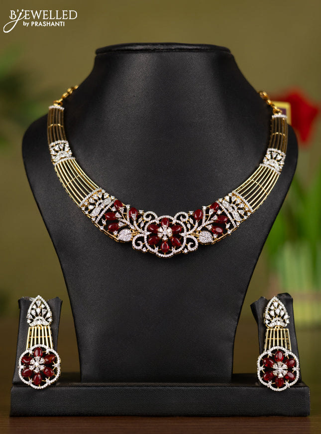 Zircon necklace with cz stones and maroon beads hangings in gold finish