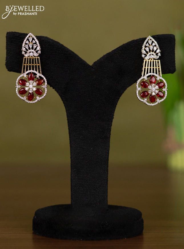 Zircon necklace with cz stones and maroon beads hangings in gold finish