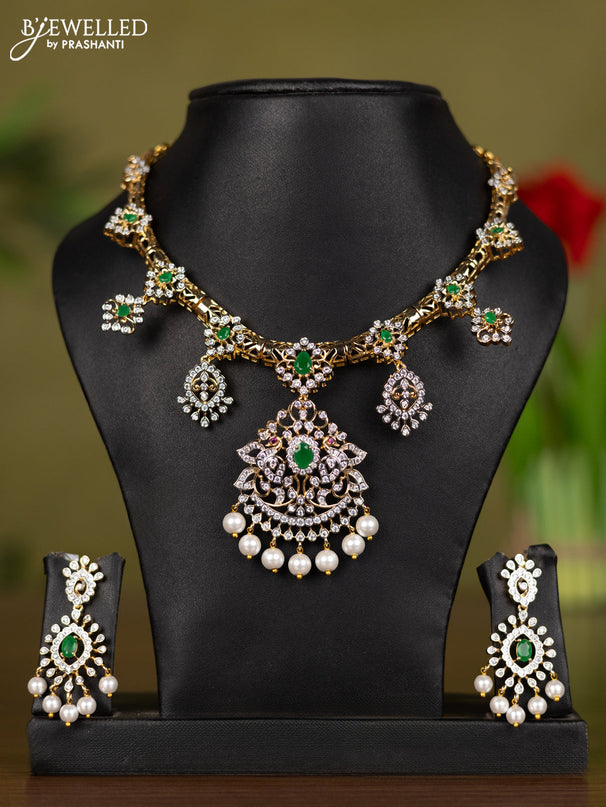 Zircon necklace with emerald & cz stones and pearl hangings in gold finish