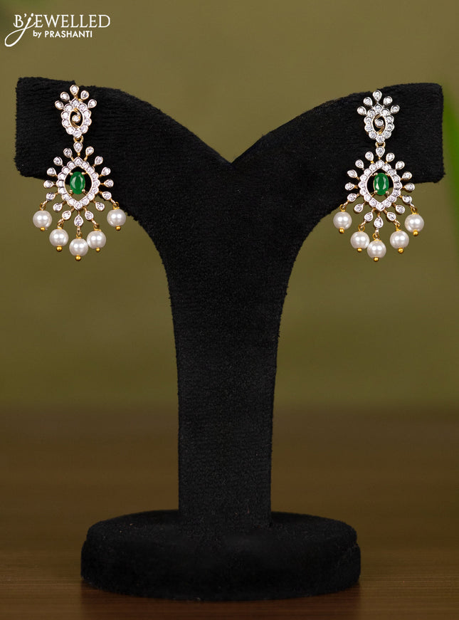 Zircon necklace with emerald & cz stones and pearl hangings in gold finish