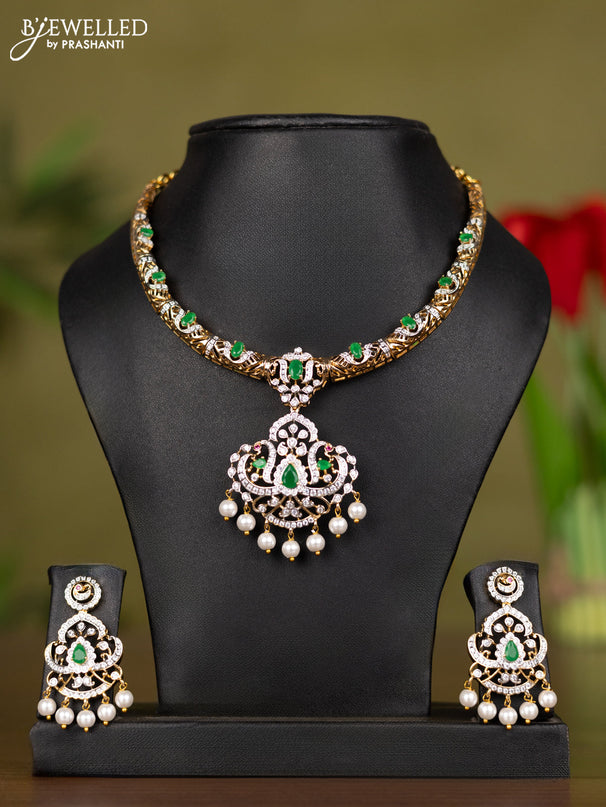 Zircon necklace with emerald & cz stones and pearl hangings in gold finish