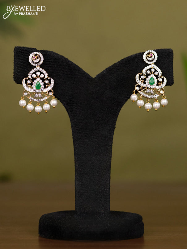 Zircon necklace with emerald & cz stones and pearl hangings in gold finish
