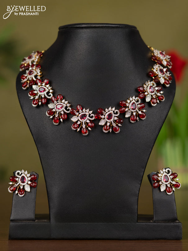 Zircon necklace with ruby & cz stones and maroon beads in gold finish