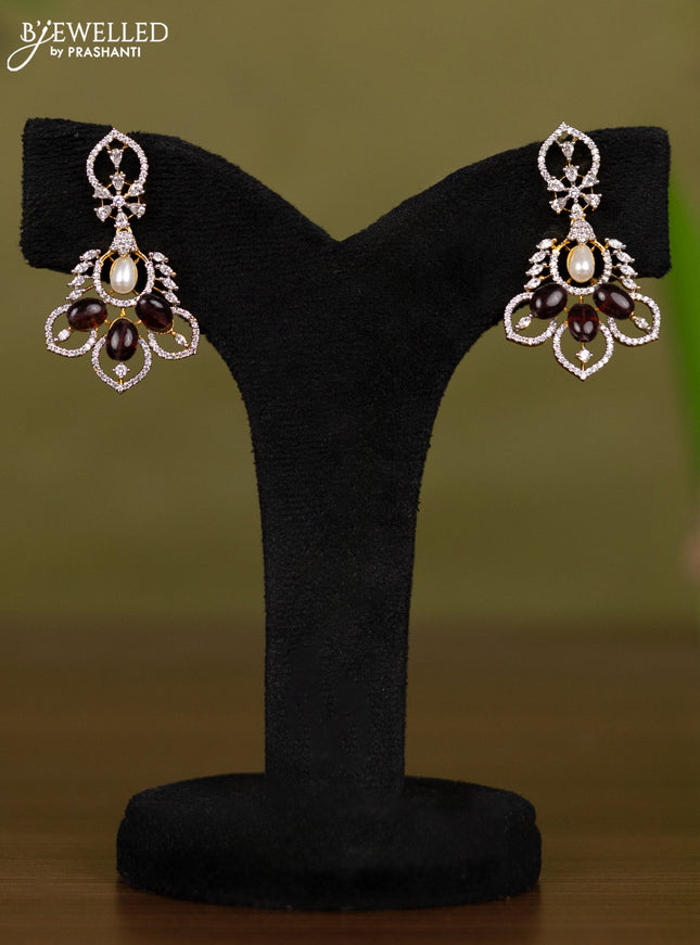 Zircon necklace with cz stones and pearl & brown beads in gold finish