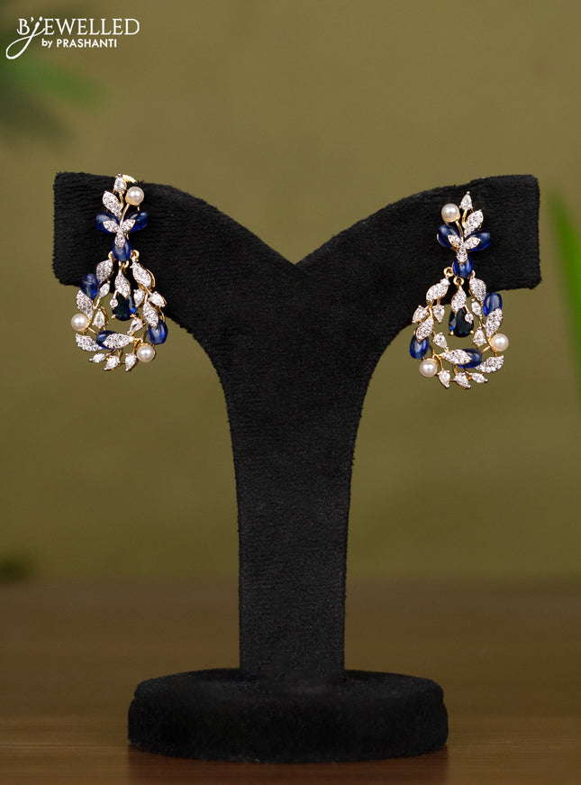 Zircon necklace with cz stones and pearl & blue beads in gold finish