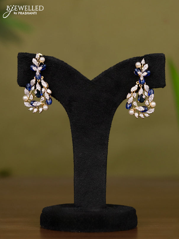 Zircon necklace with cz stones and pearl & blue beads in gold finish