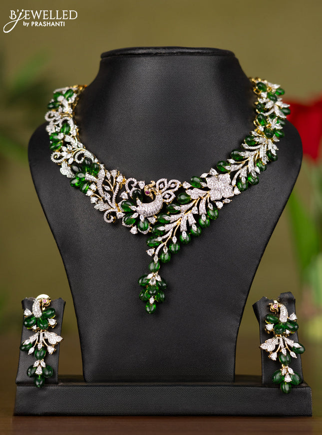 Zircon necklace with cz stones and green beads in gold finish