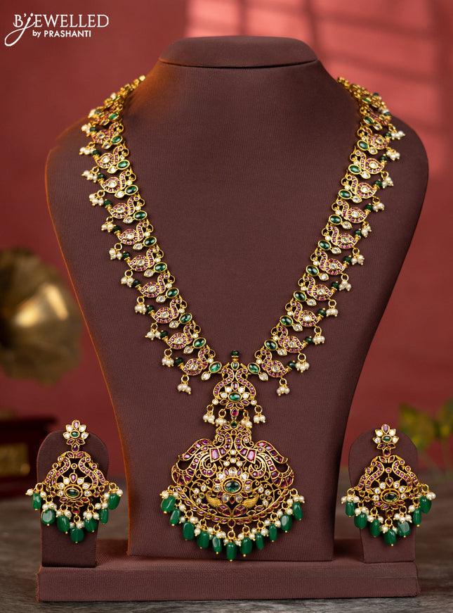 Antique haaram double peacock design with kemp and white stones & green beads hanging