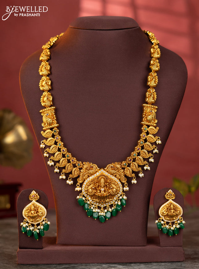Antique haaram mango and lakshmi design with white and kemp stones and green beads hanging
