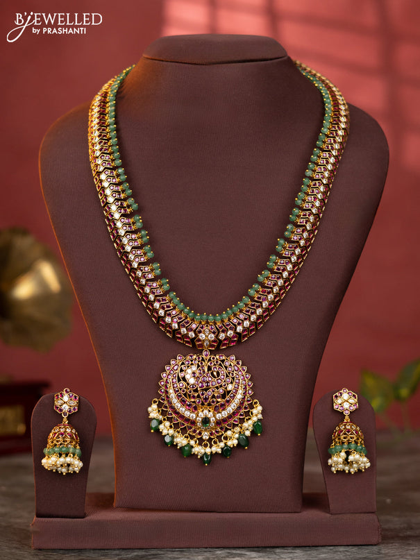 Antique haaram peacock design with kemp and white stones & green beads hanging
