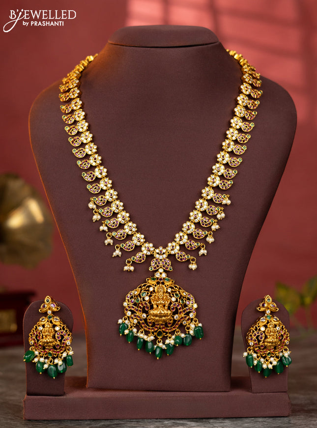 Antique haaram mango and lakshmi design with white and kemp stones and green beads hanging