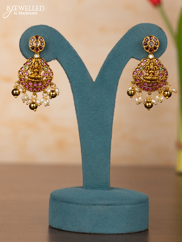 Antique bottumala peacock design haaram in kemp stones and pearl hanging