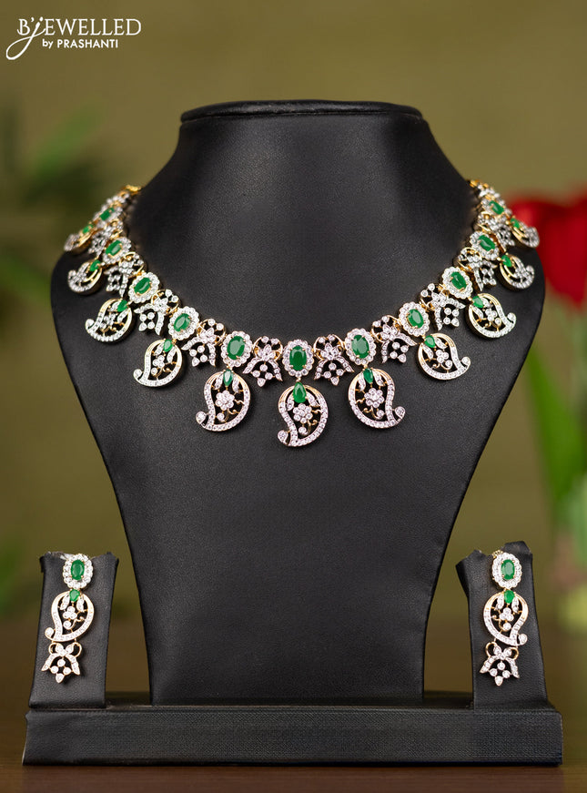 Zircon necklace manga pattern with emerald and cz stones in gold finish
