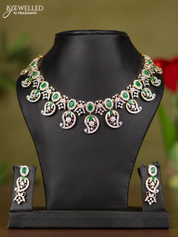 Zircon necklace manga pattern with emerald and cz stones in gold finish