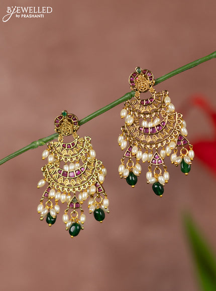 Antique earrings with two step model in kemp stones and green beads & rice pearl hanging