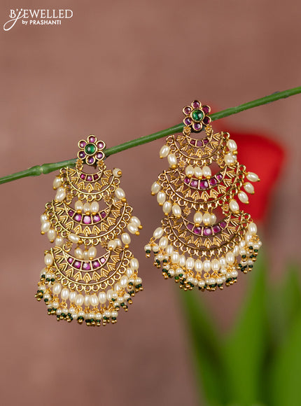 Antique earrings with floral deisgn and three step model in kemp stones and pearl hanging