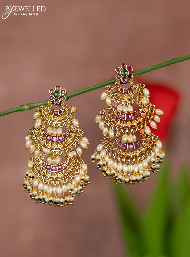 Antique earrings with floral deisgn and three step model in kemp stones and pearl hanging