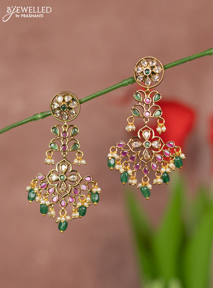 Antique earring hanging type floral design with kemp and white stones and green beads hanging