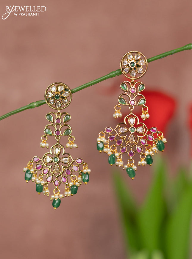 Antique earring hanging type floral design with kemp and white stones and green beads hanging