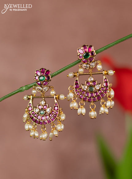 Antique earring chandbali type with kemp and white stones and pearl hangings