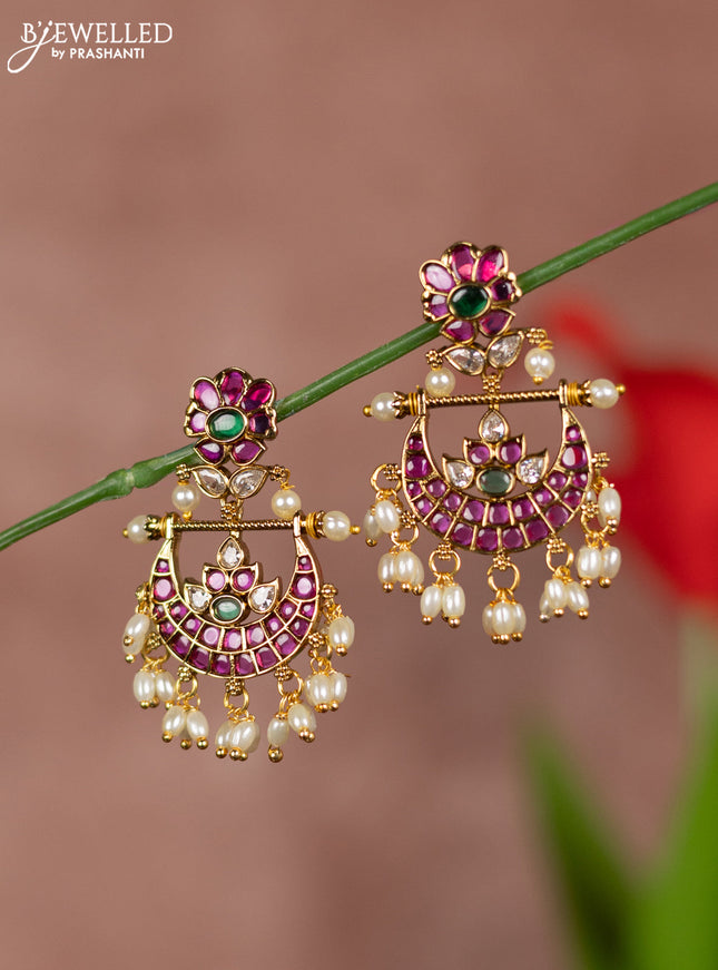Antique earring chandbali type with kemp and white stones and pearl hangings