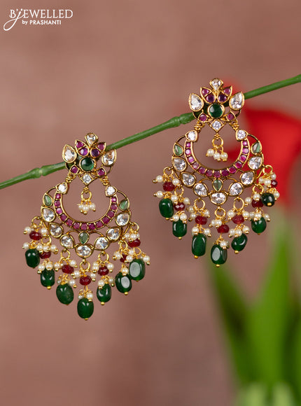 Antique earring chandbali type with kemp and white stones and green beads hanging