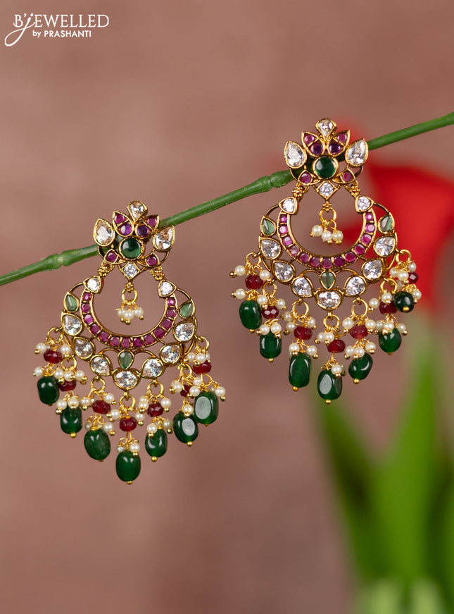 Antique earring chandbali type with kemp and white stones and green beads hanging