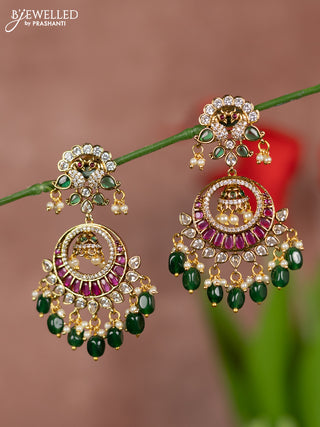 Antique earrings with chandbali double peacock deisgn in kemp and white stones  & pearl hanging