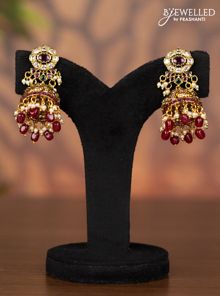 Antique jhumka lakshmi design with kemp & cz stones and pearl & pink beads hangings