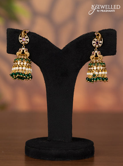 Antique jhumka peacock design with kemp & cz stones and green beads hangings