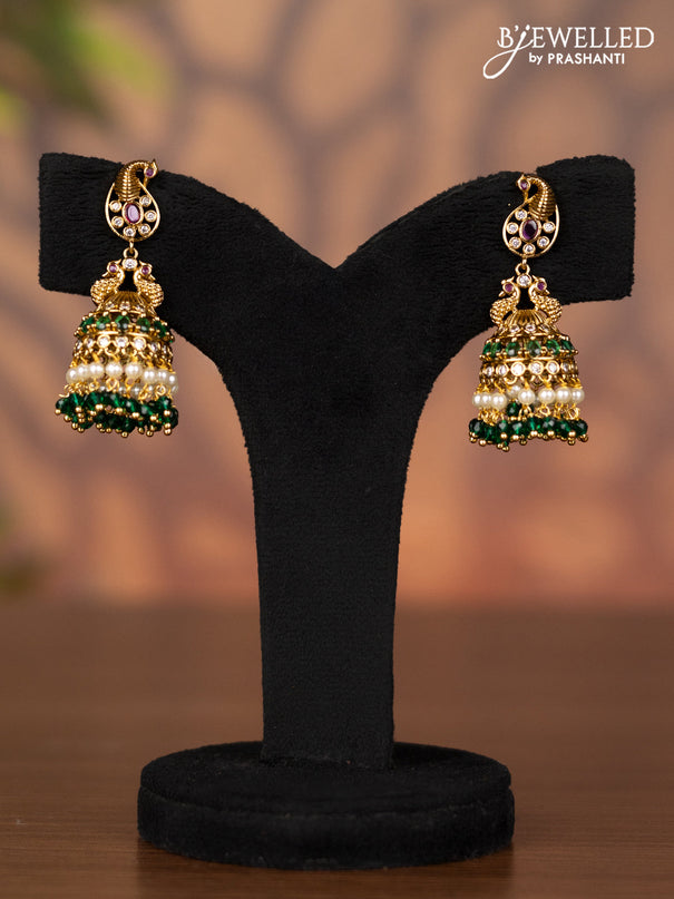 Antique jhumka peacock design with kemp & cz stones and green beads hangings