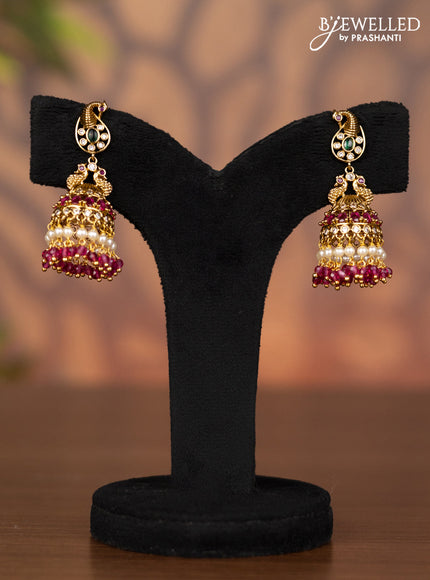 Antique jhumka peacock design with kemp & cz stones and pink beads hangings