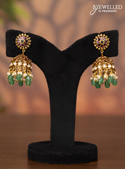 Antique jhumka with kemp & kundan stones and pearl & green beads hangings