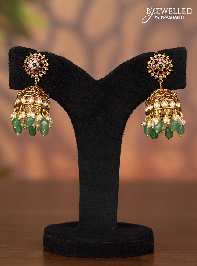 Antique jhumka with kemp & kundan stones and pearl & green beads hangings