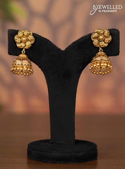 Antique jhumka with simple design and golden beads hangings
