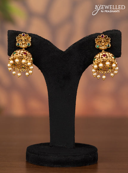 Antique jhumka lakshmi design with kemp stones and pearl hangings