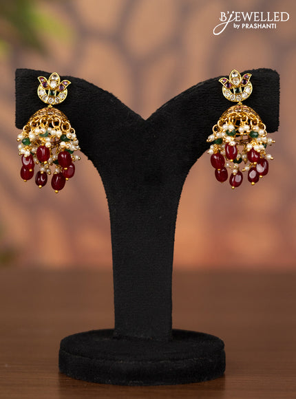 Antique jhumka with kemp & cz stones and pearl & pink beads hangings