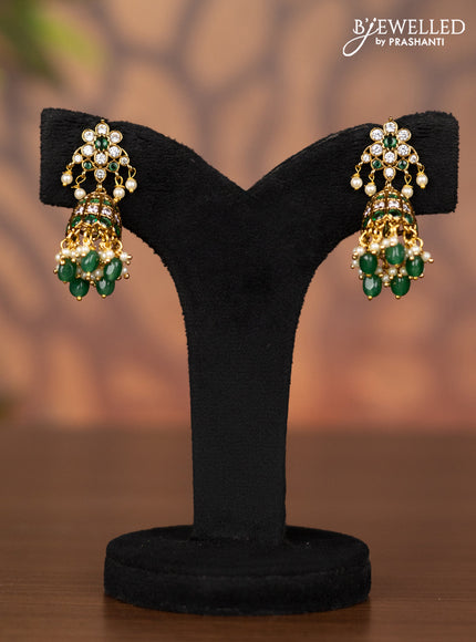 Antique jhumka with emerald & kundan stones and pearl & green beads hangings