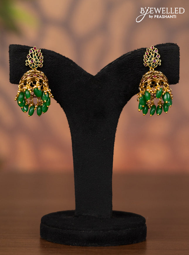 Antique jhumka with kemp stones and pearl & green beads hangings